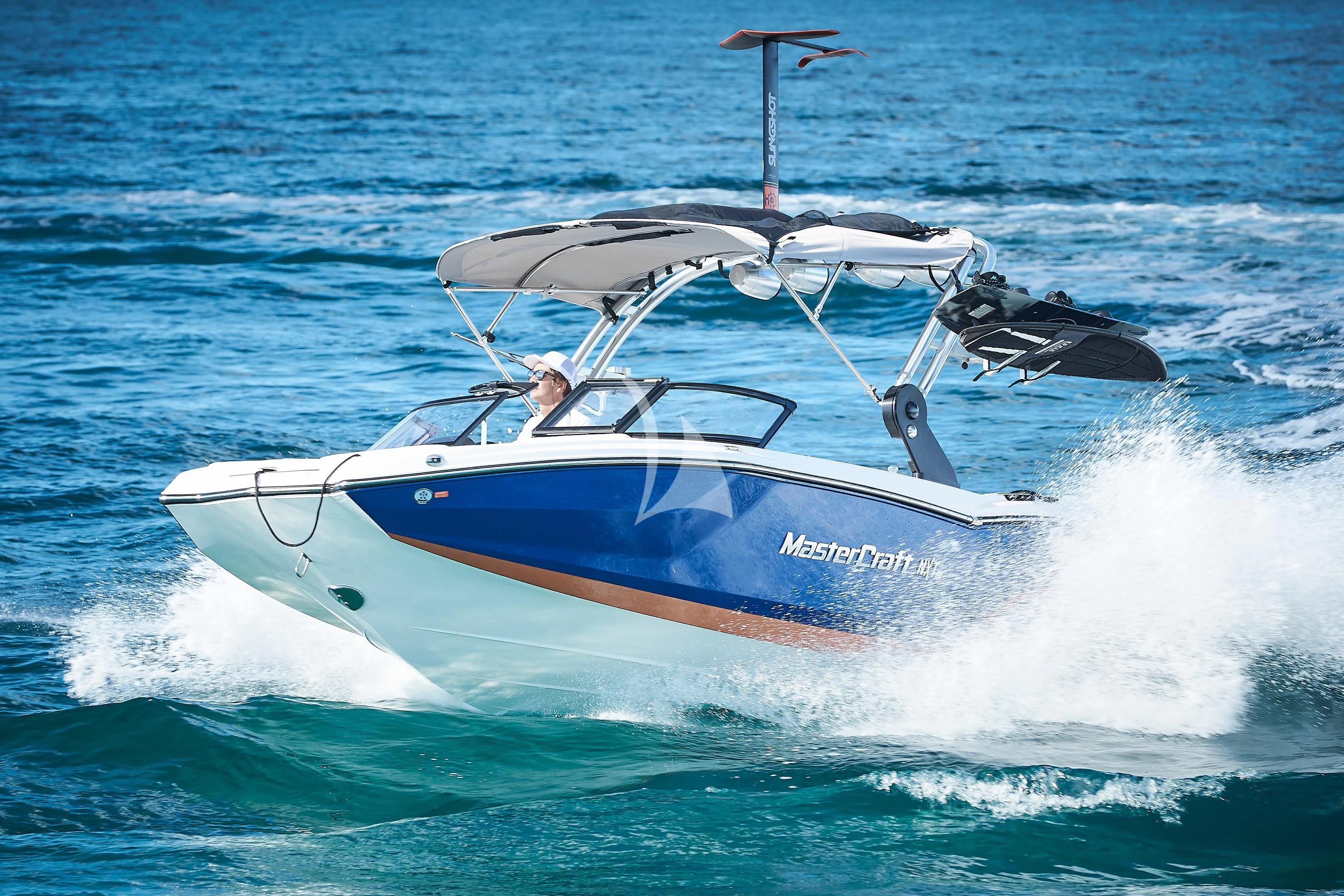 a boat with a drone flying over it aboard ARKADIA Yacht for Charter
