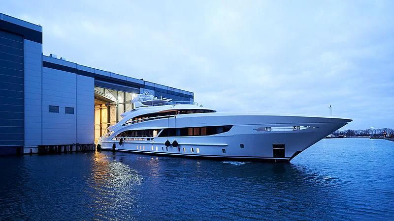 a large white yacht in a body of water aboard ARKADIA Yacht for Charter