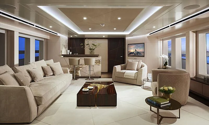 a living room with a couch and a coffee table aboard ARKADIA Yacht for Charter