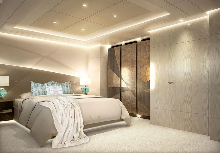 a room with a bed and a lamp aboard ARKADIA Yacht for Charter