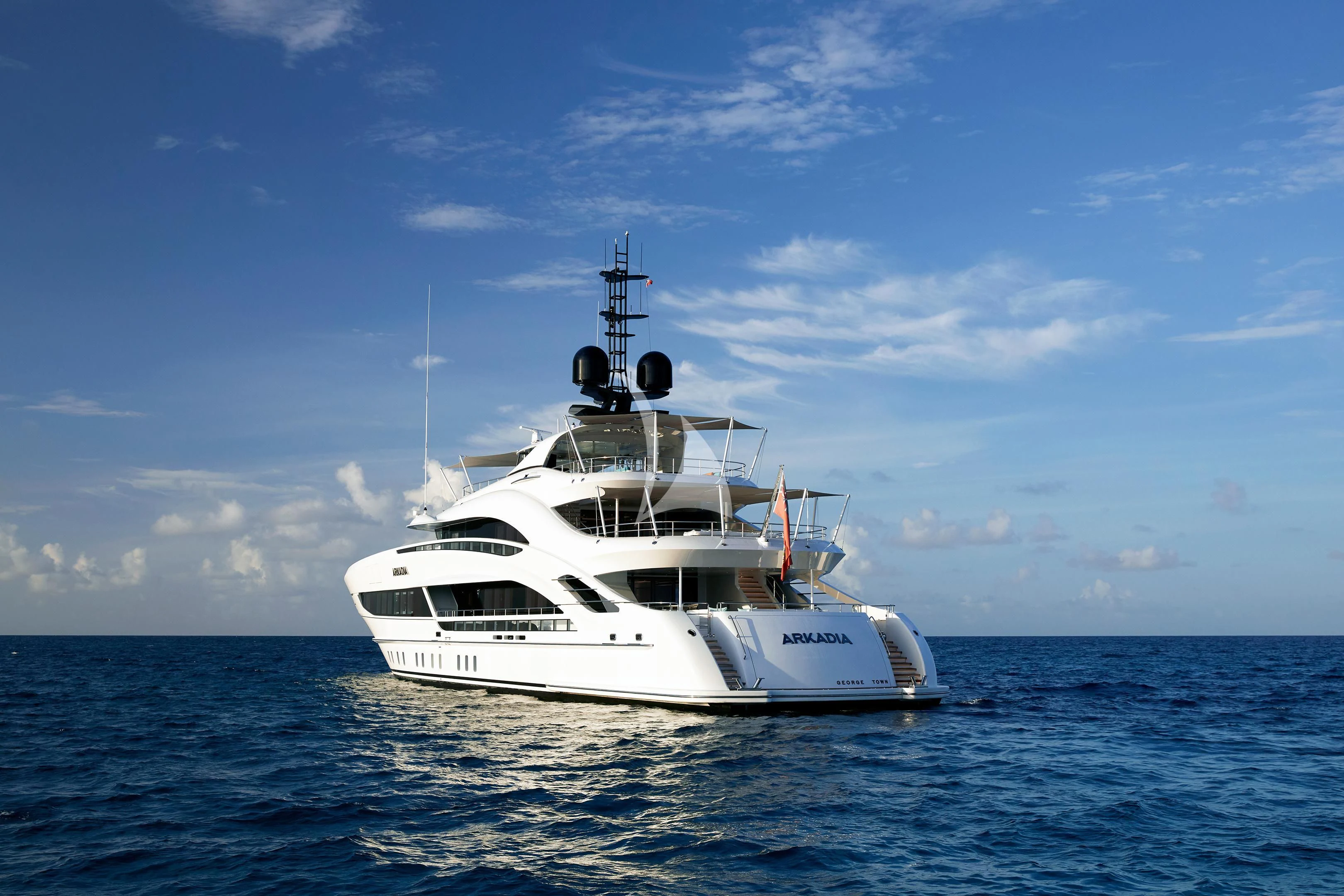 a white boat in the water aboard ARKADIA Yacht for Charter