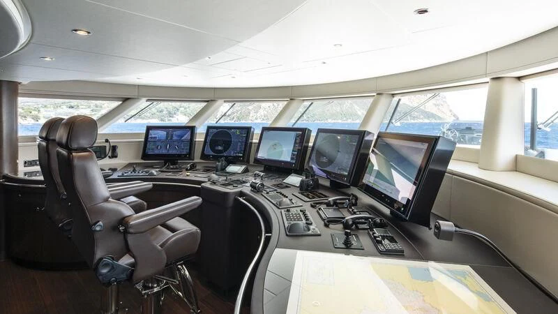 inside of a vehicle with many monitors aboard ARKADIA Yacht for Charter