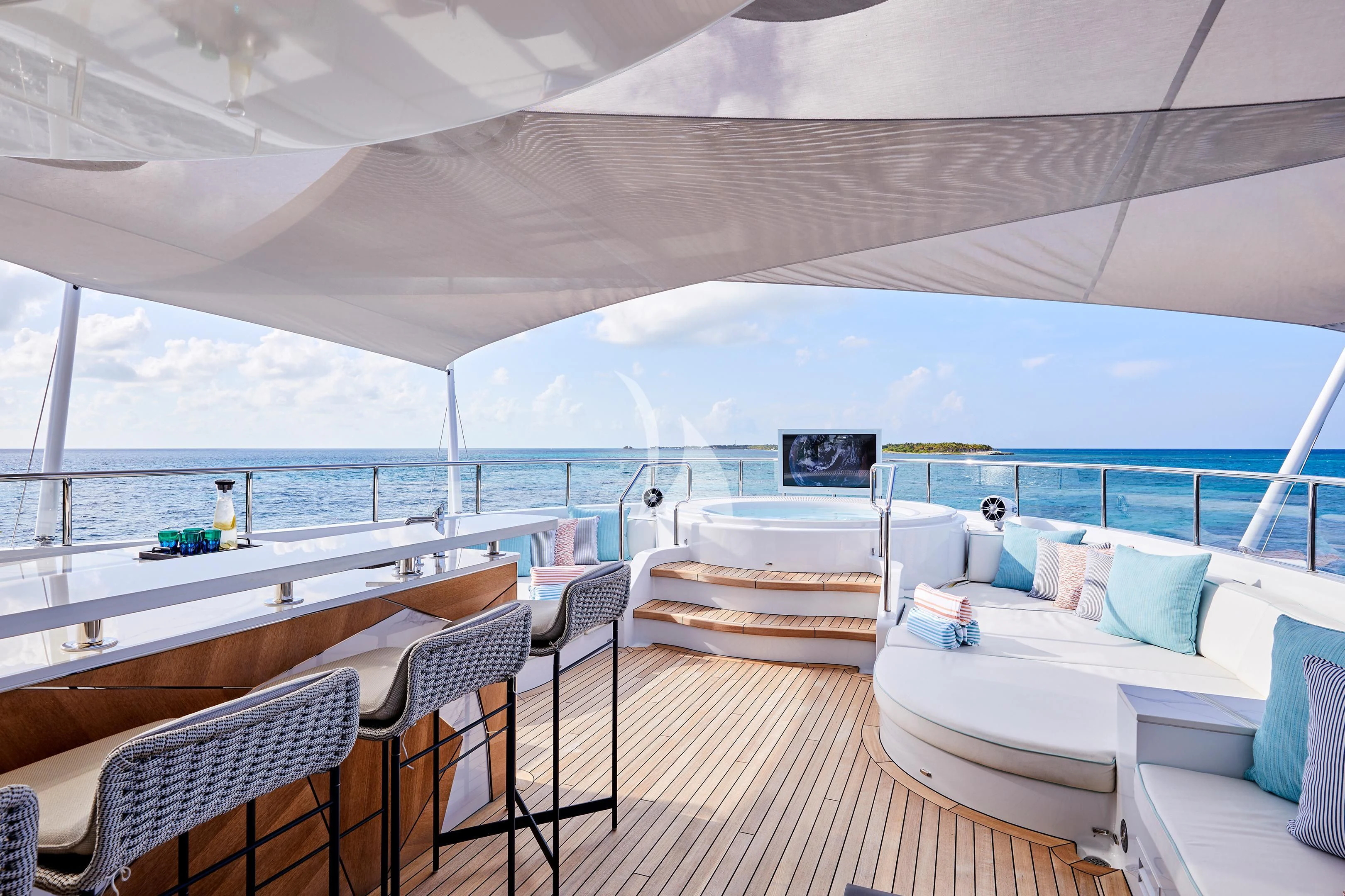 a room with a table and chairs aboard ARKADIA Yacht for Charter