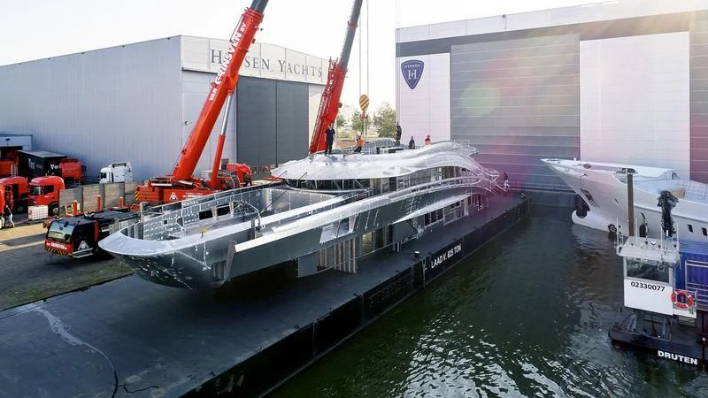 a large ship docked aboard ARKADIA Yacht for Charter