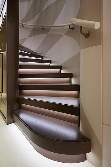 a set of stairs in a room aboard ARKADIA Yacht for Charter