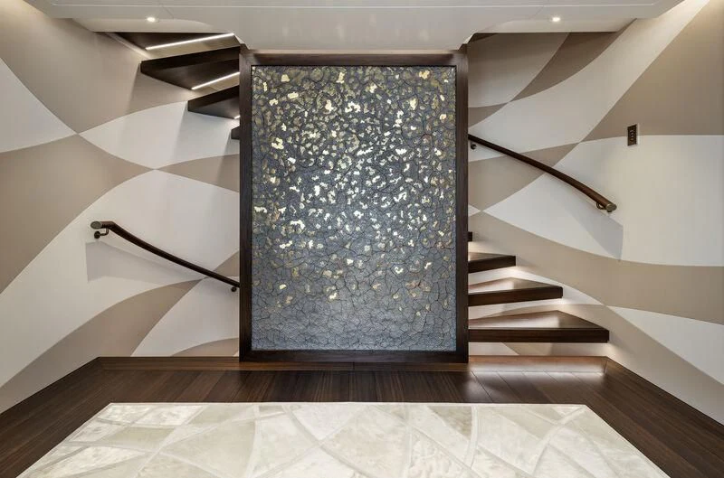 a glass case on a staircase aboard ARKADIA Yacht for Charter