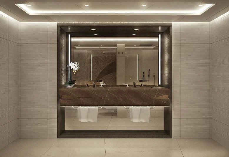a large bathroom with a large mirror aboard ARKADIA Yacht for Charter