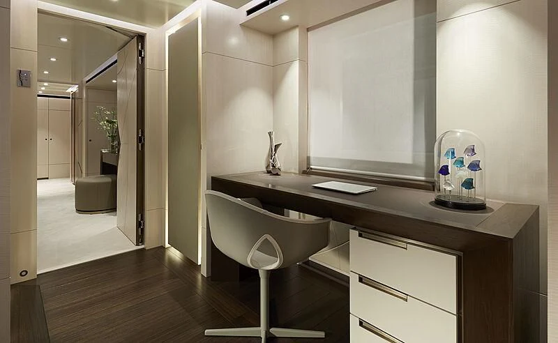 a bathroom with a sink and a mirror aboard ARKADIA Yacht for Charter