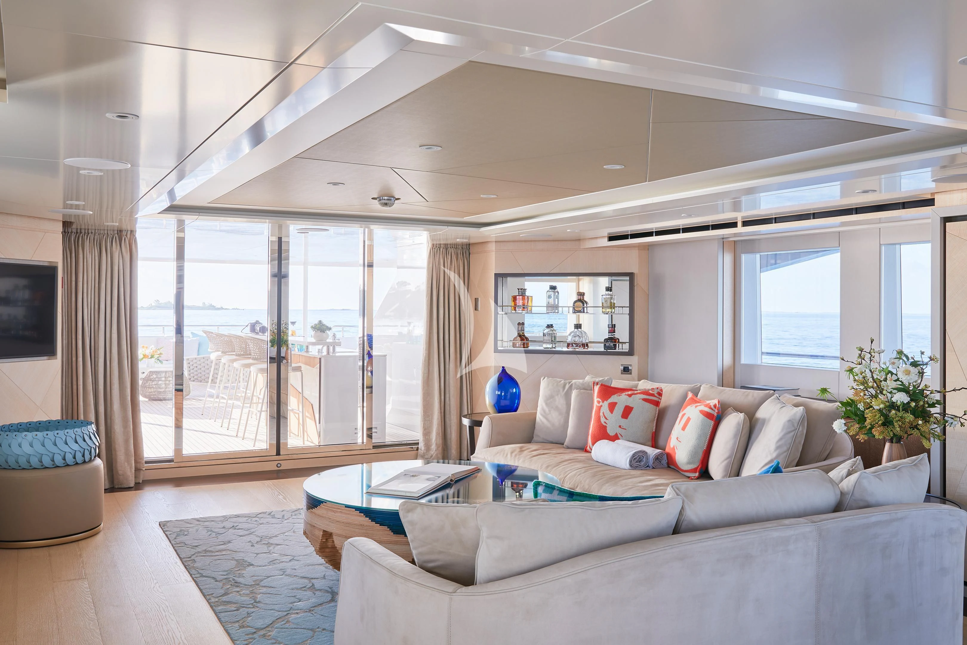 a living room with a large window aboard ARKADIA Yacht for Charter