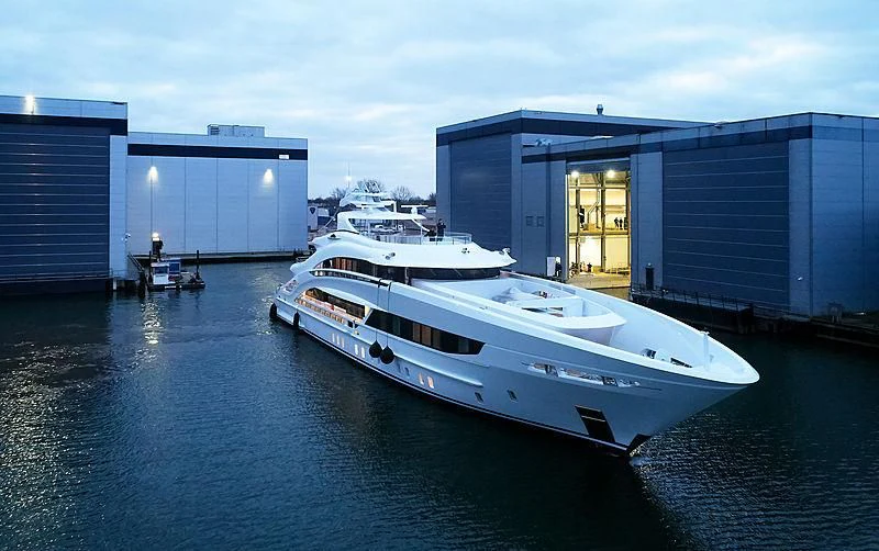 a white boat in a body of water aboard ARKADIA Yacht for Charter
