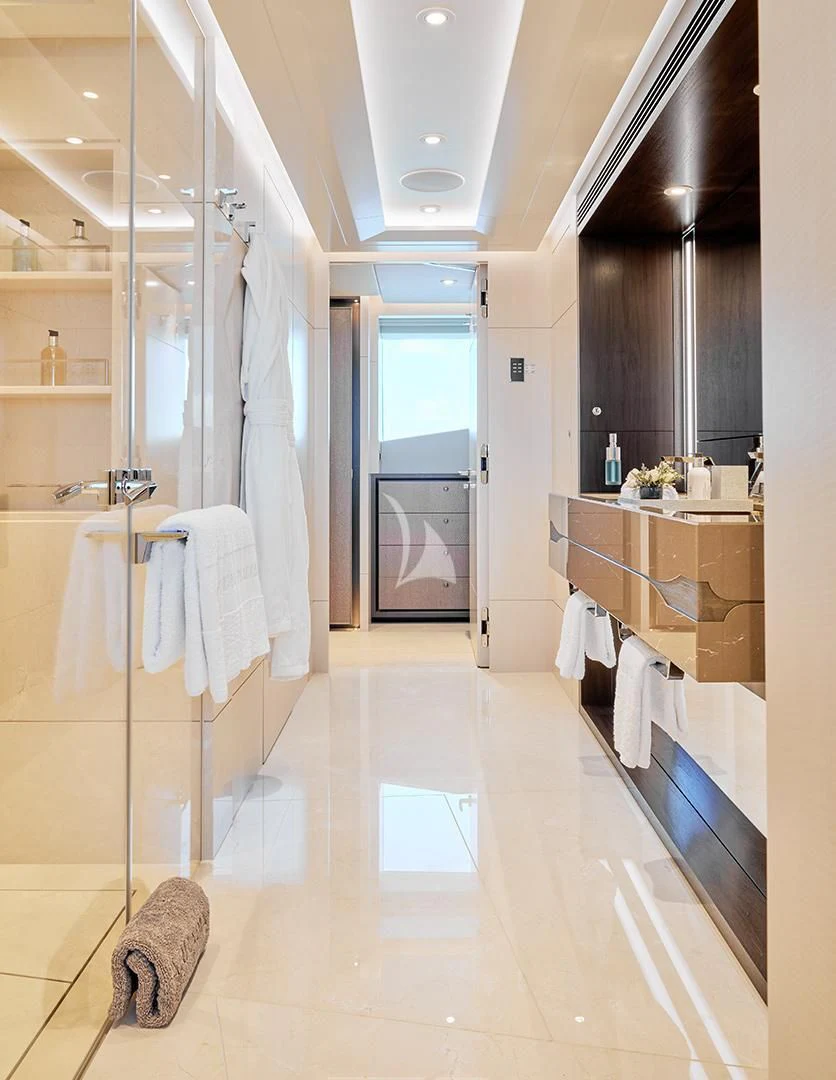a bathroom with a large mirror aboard ARKADIA Yacht for Charter
