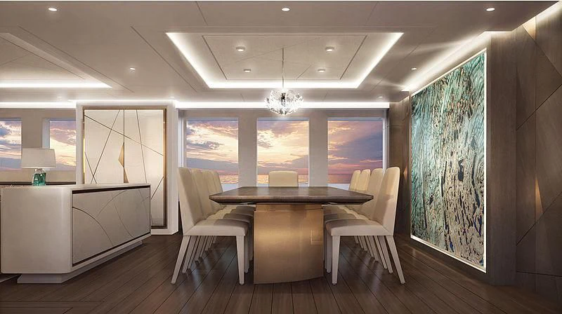 a room with a table and chairs aboard ARKADIA Yacht for Charter