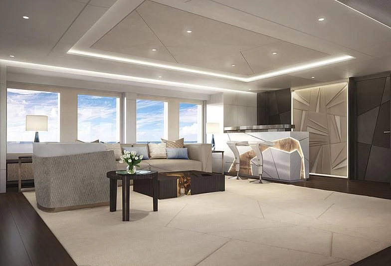 a large living room with a large white couch and a large window aboard ARKADIA Yacht for Charter