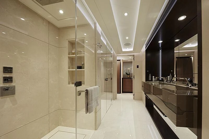 a bathroom with a large glass shower aboard ARKADIA Yacht for Charter