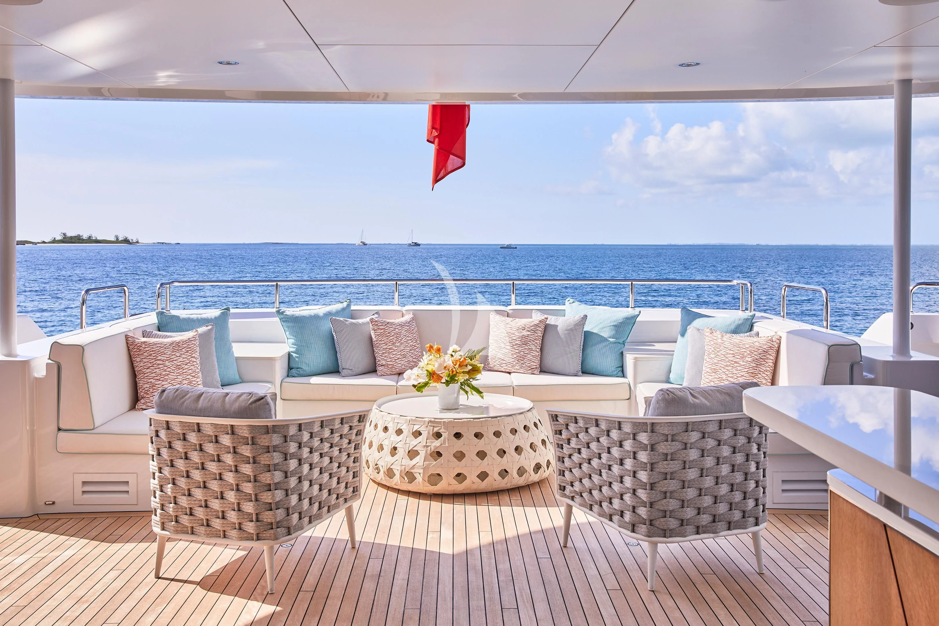 a patio with a table and chairs aboard ARKADIA Yacht for Charter