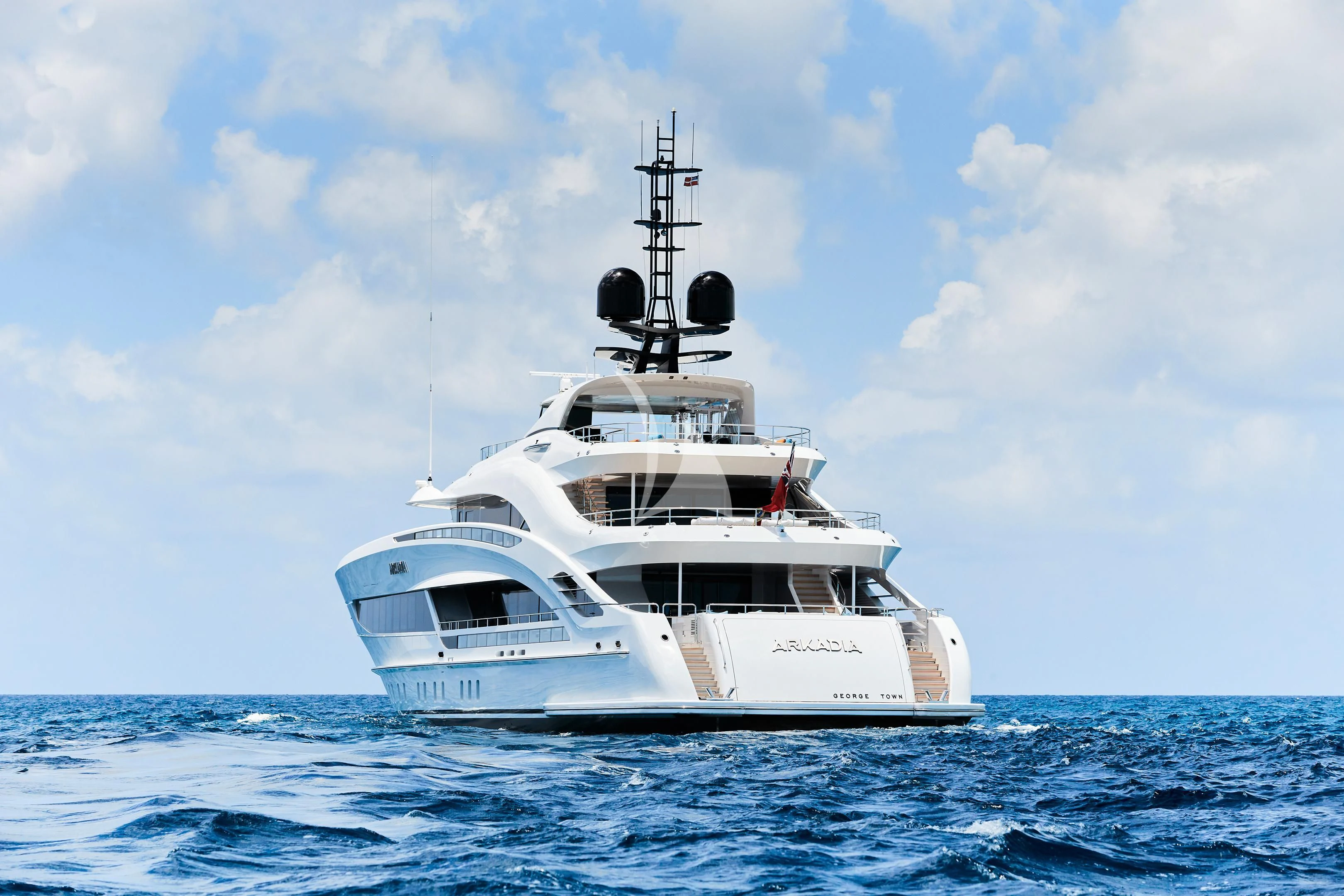a white boat in the water aboard ARKADIA Yacht for Charter