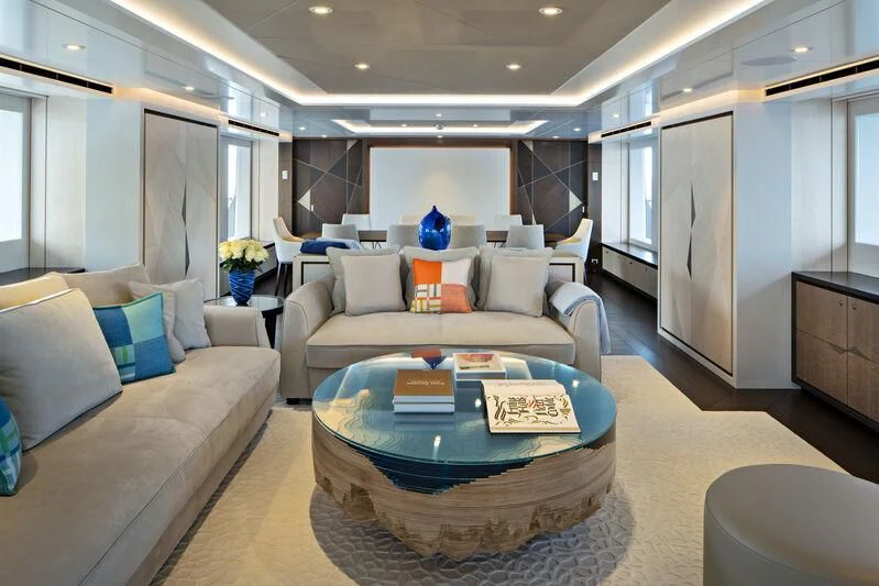 a living room with a couch and a table aboard ARKADIA Yacht for Charter