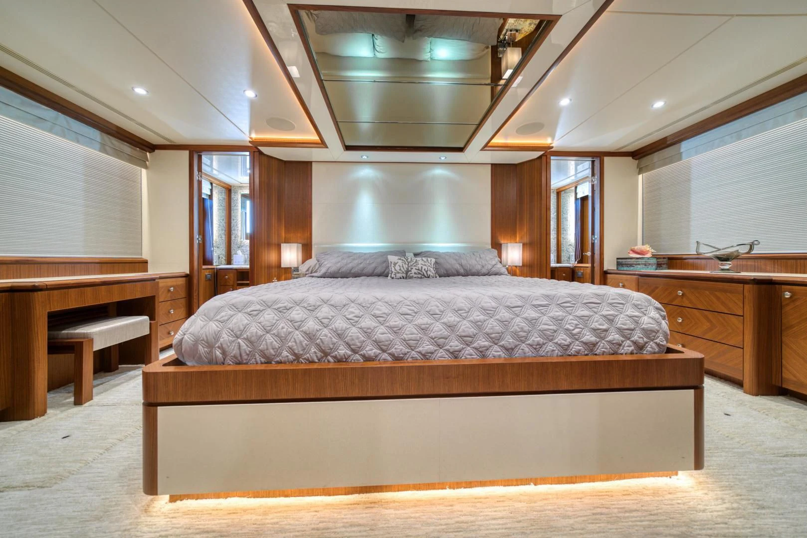 a large bed in a room aboard SANCTUARY Yacht for Sale