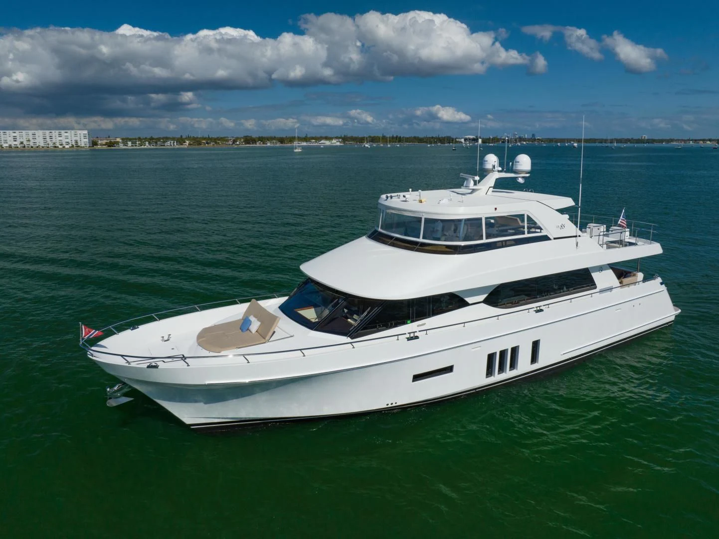a white boat in the water aboard SANCTUARY Yacht for Sale
