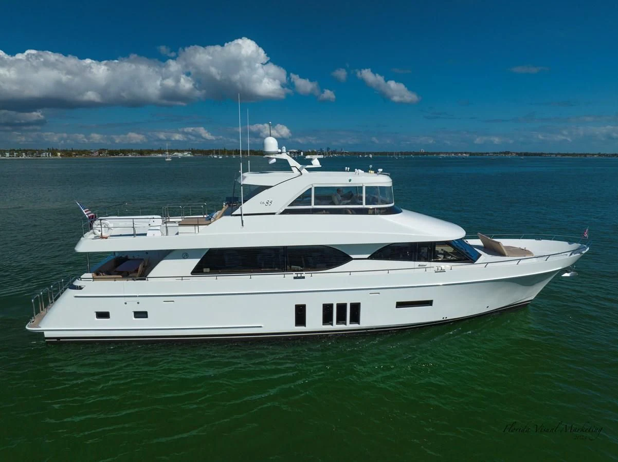 a white yacht in the water aboard SANCTUARY Yacht for Sale