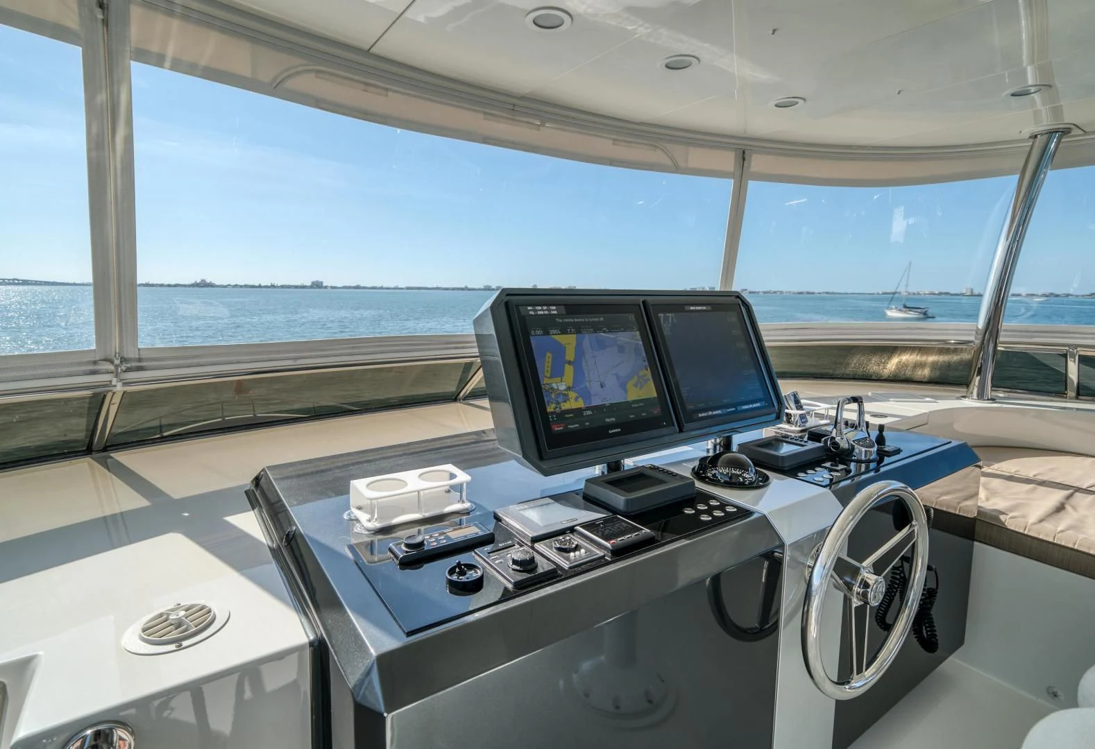a room with a large window and a view of the ocean aboard SANCTUARY Yacht for Sale