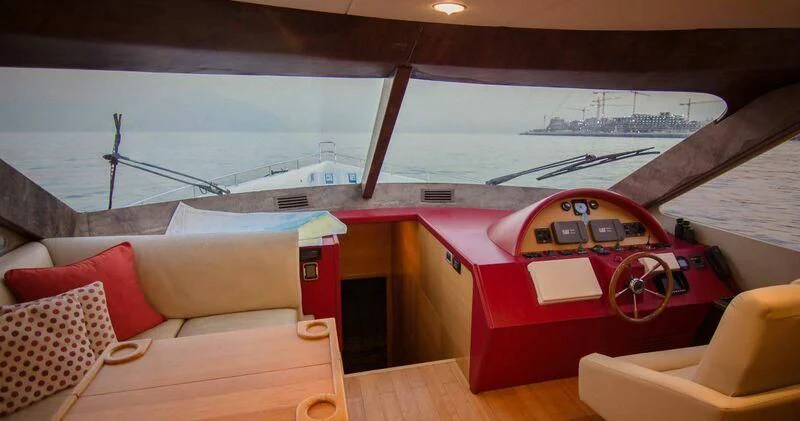 a car on a boat aboard DURETTI 85 Yacht for Sale