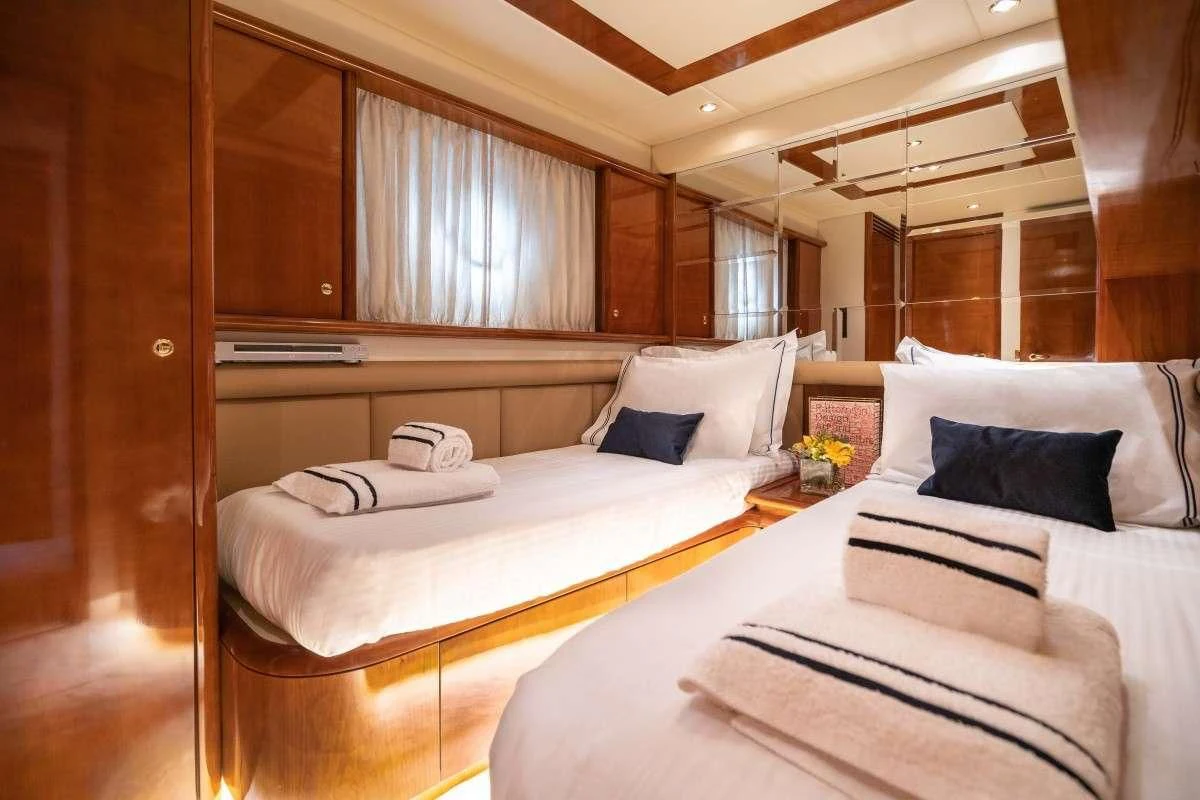 a couple of beds in a room aboard ESTIA ZEUS Yacht for Charter