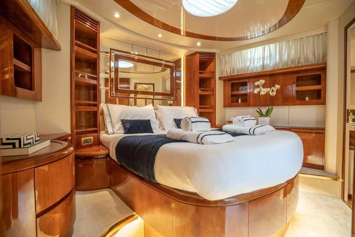 a large bed in a room aboard ESTIA ZEUS Yacht for Charter