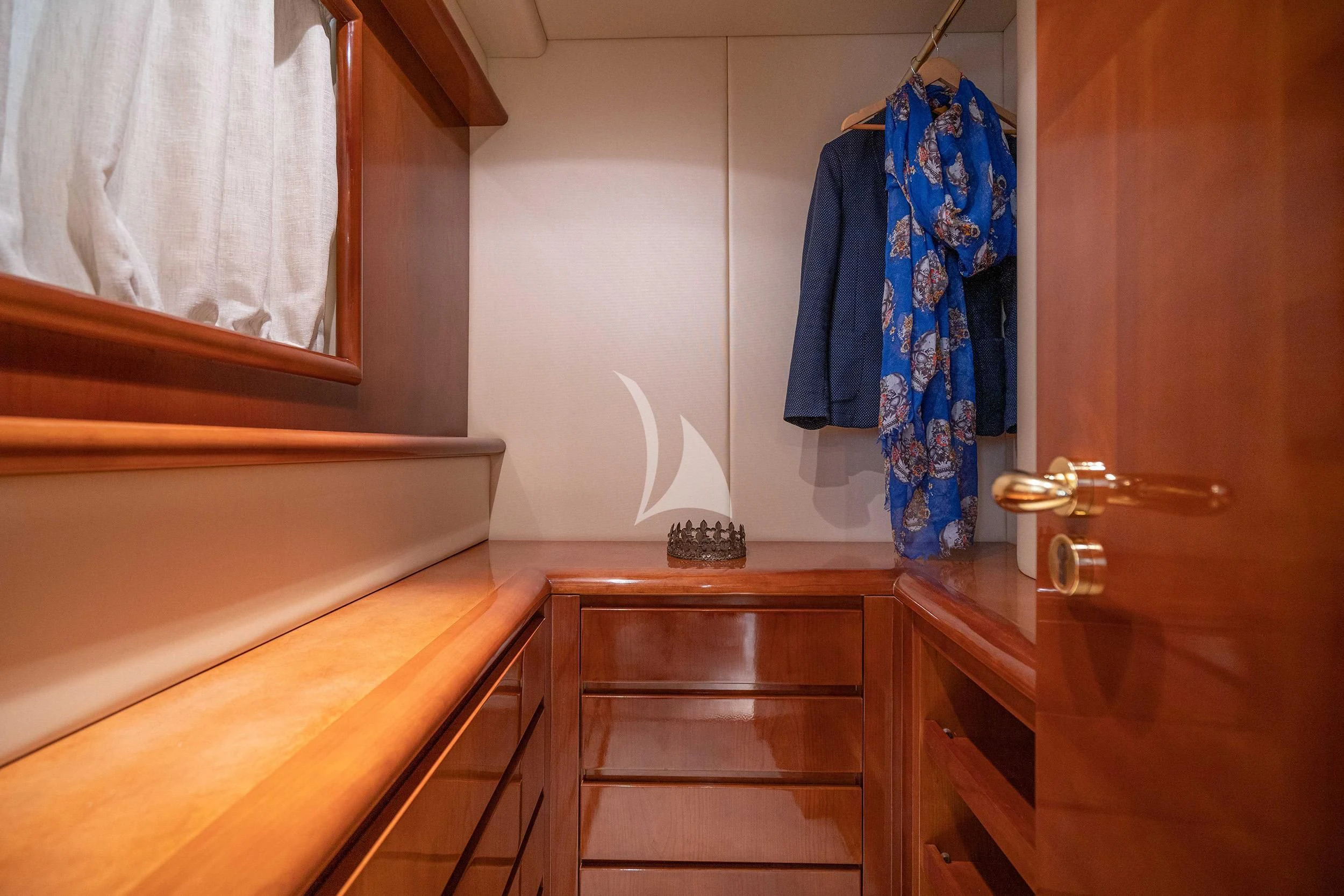 a bathroom with a blue towel on the wall aboard ESTIA ZEUS Yacht for Charter