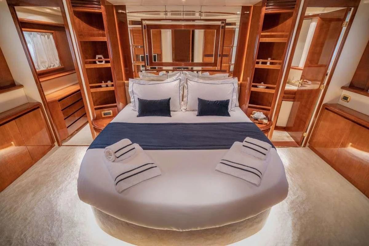 a large bed in a room aboard ESTIA ZEUS Yacht for Charter