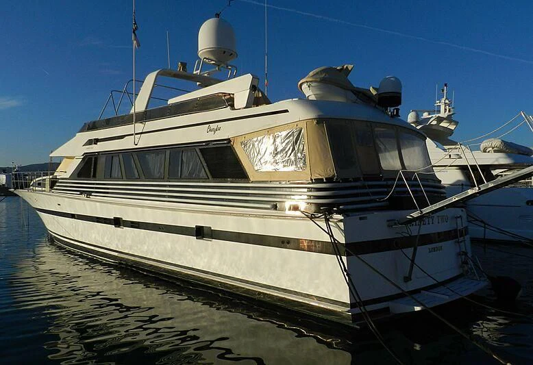 a boat docked at a pier aboard NINETY TWO Yacht for Sale