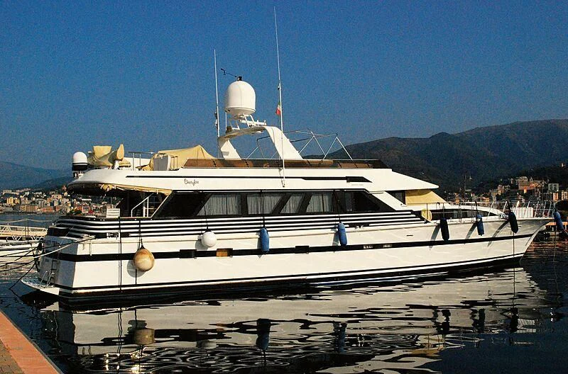 a large white boat in a harbor aboard NINETY TWO Yacht for Sale