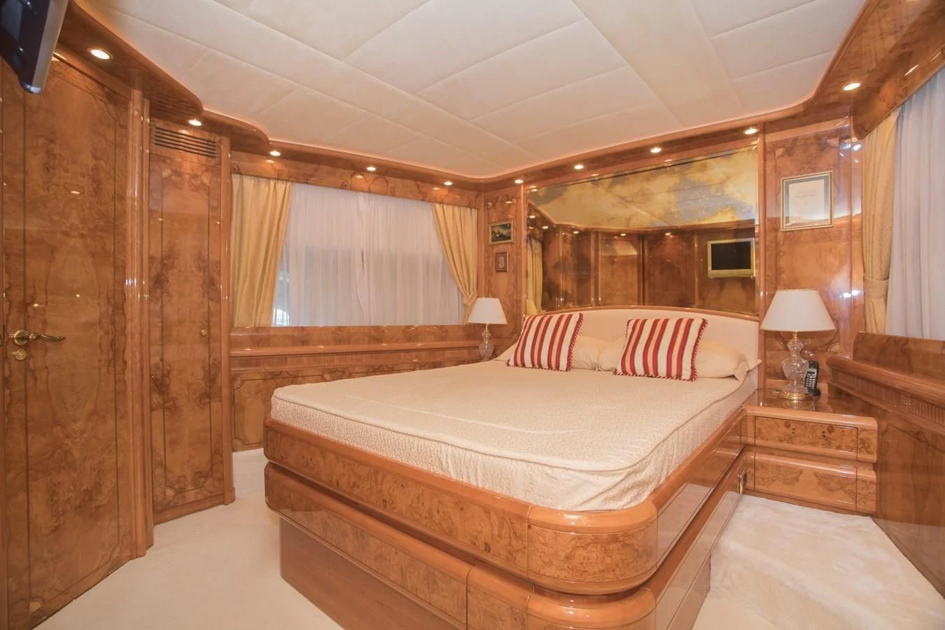 a large bed in a room aboard LADY ADELHEID Yacht for Sale