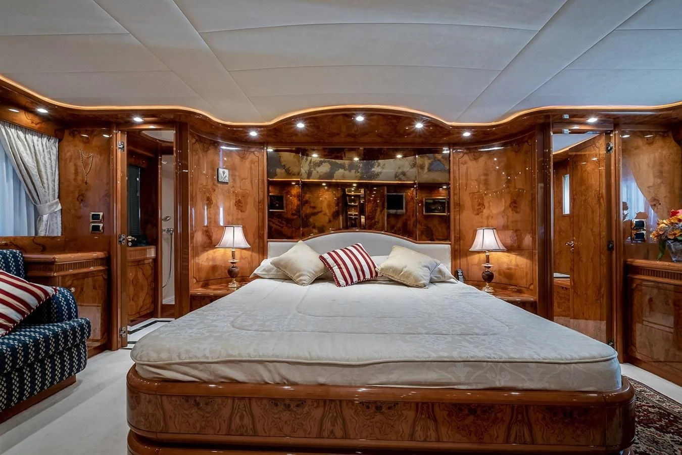 a large bed in a room aboard LADY ADELHEID Yacht for Sale