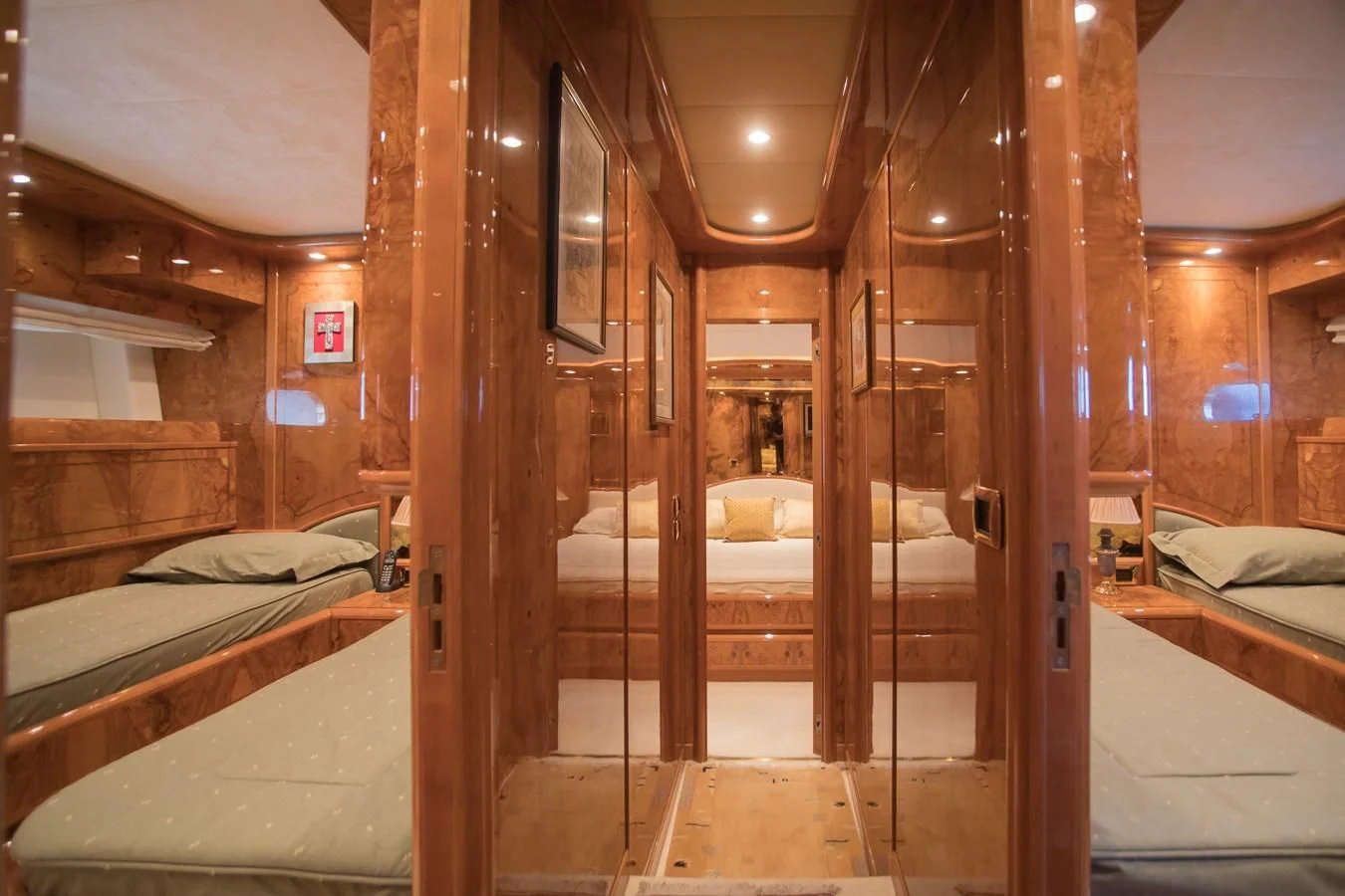 a room with wooden walls and a bed aboard LADY ADELHEID Yacht for Sale