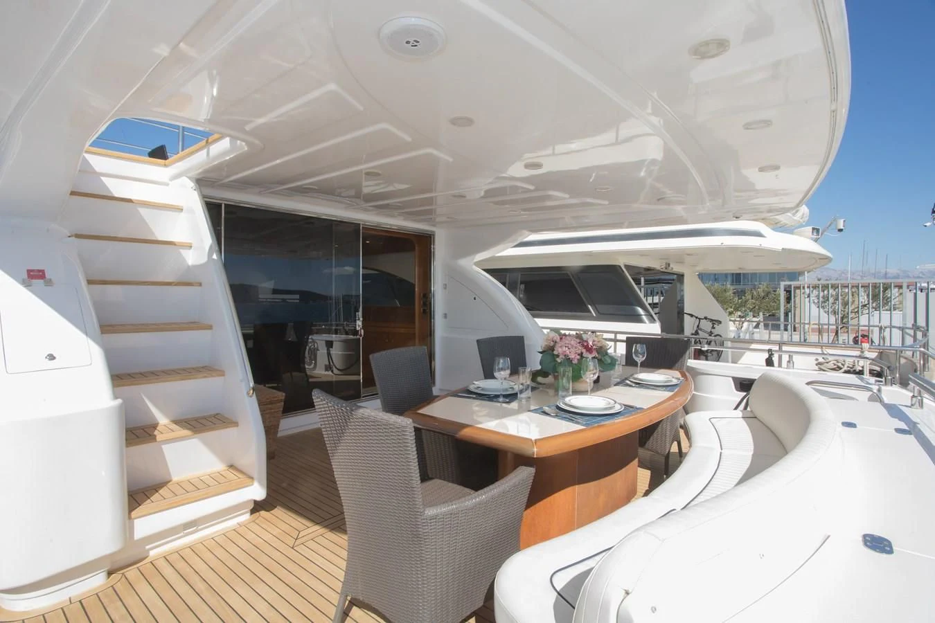 a room with a table and chairs aboard LADY ADELHEID Yacht for Sale