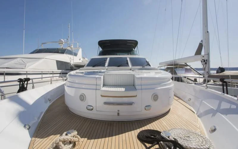 a white car parked on a wooden deck aboard LADY ADELHEID Yacht for Sale