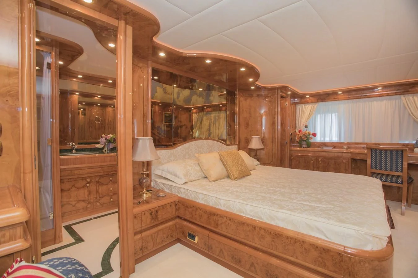 a large bedroom with a large bed aboard LADY ADELHEID Yacht for Sale