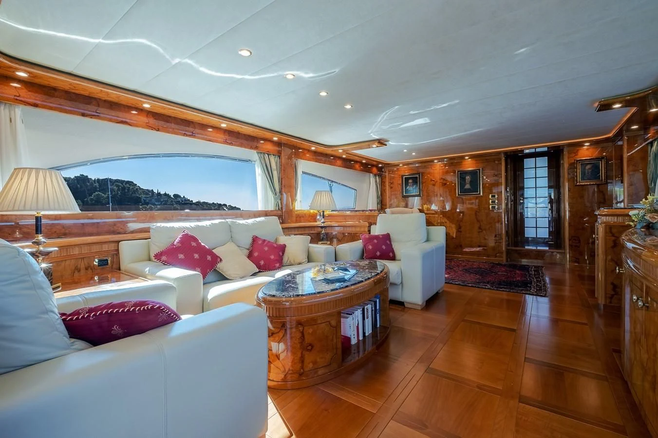 a living room with a large window aboard LADY ADELHEID Yacht for Sale