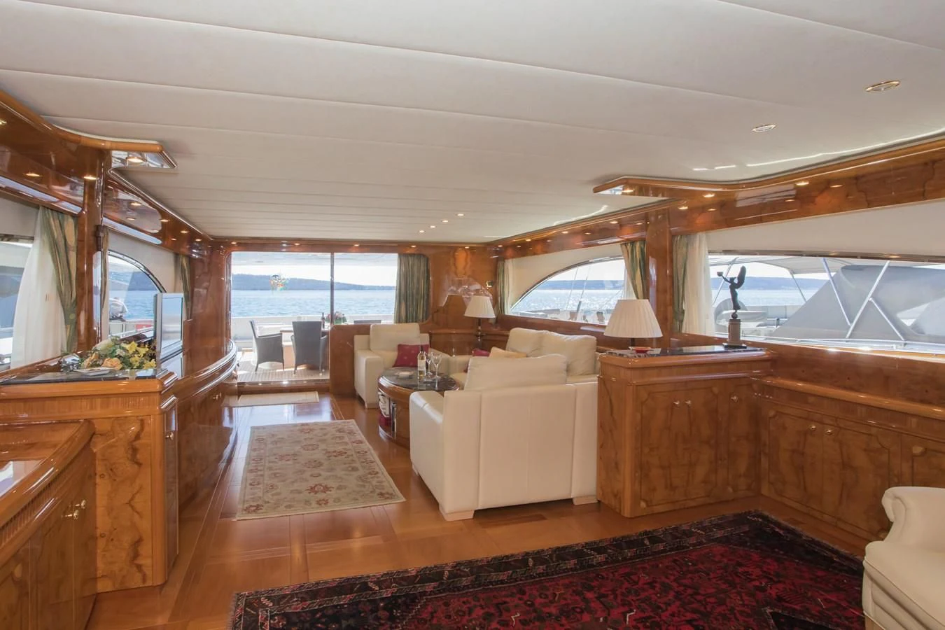 a living room with a large window aboard LADY ADELHEID Yacht for Sale