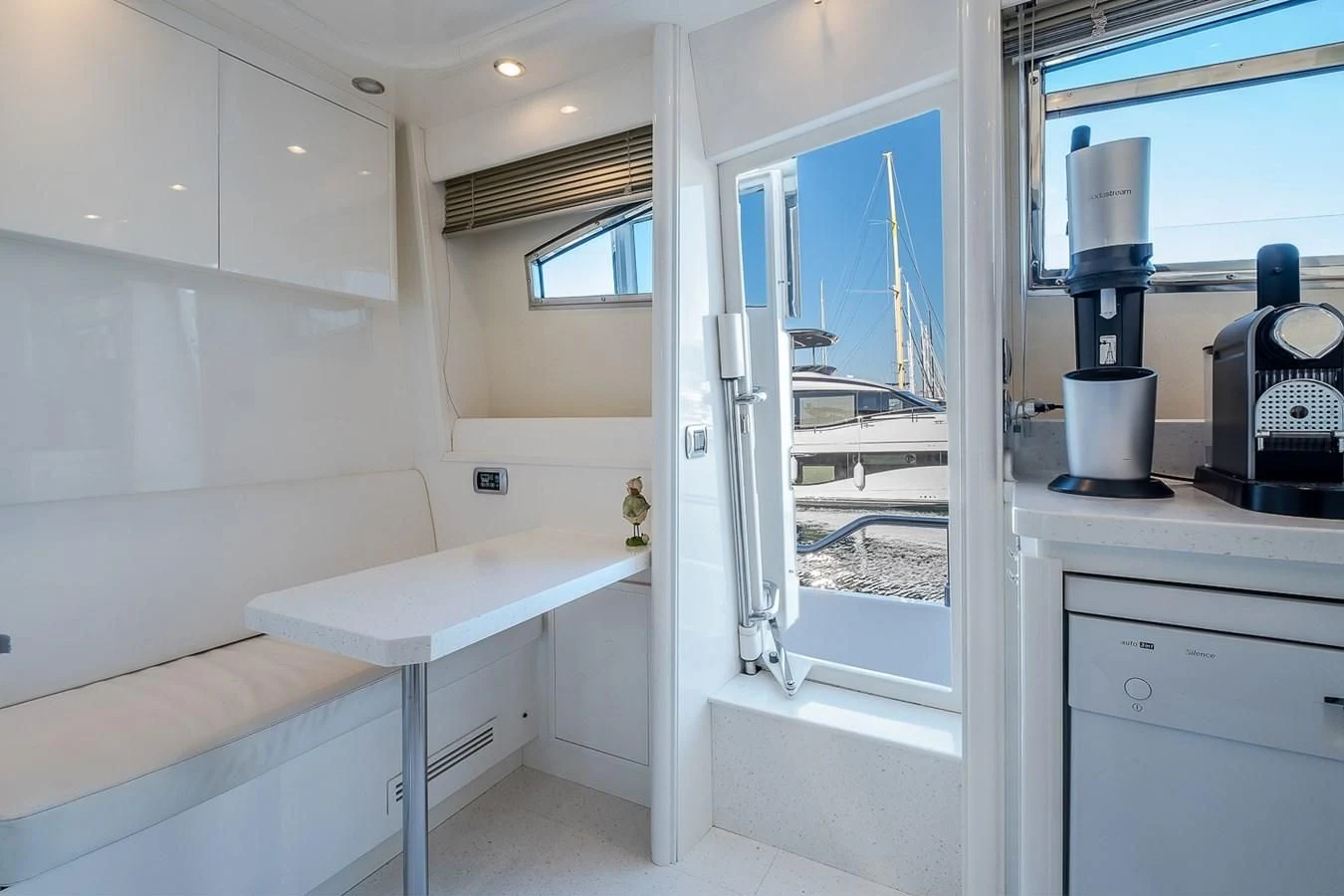 a bathroom with a sink and a large window aboard LADY ADELHEID Yacht for Sale