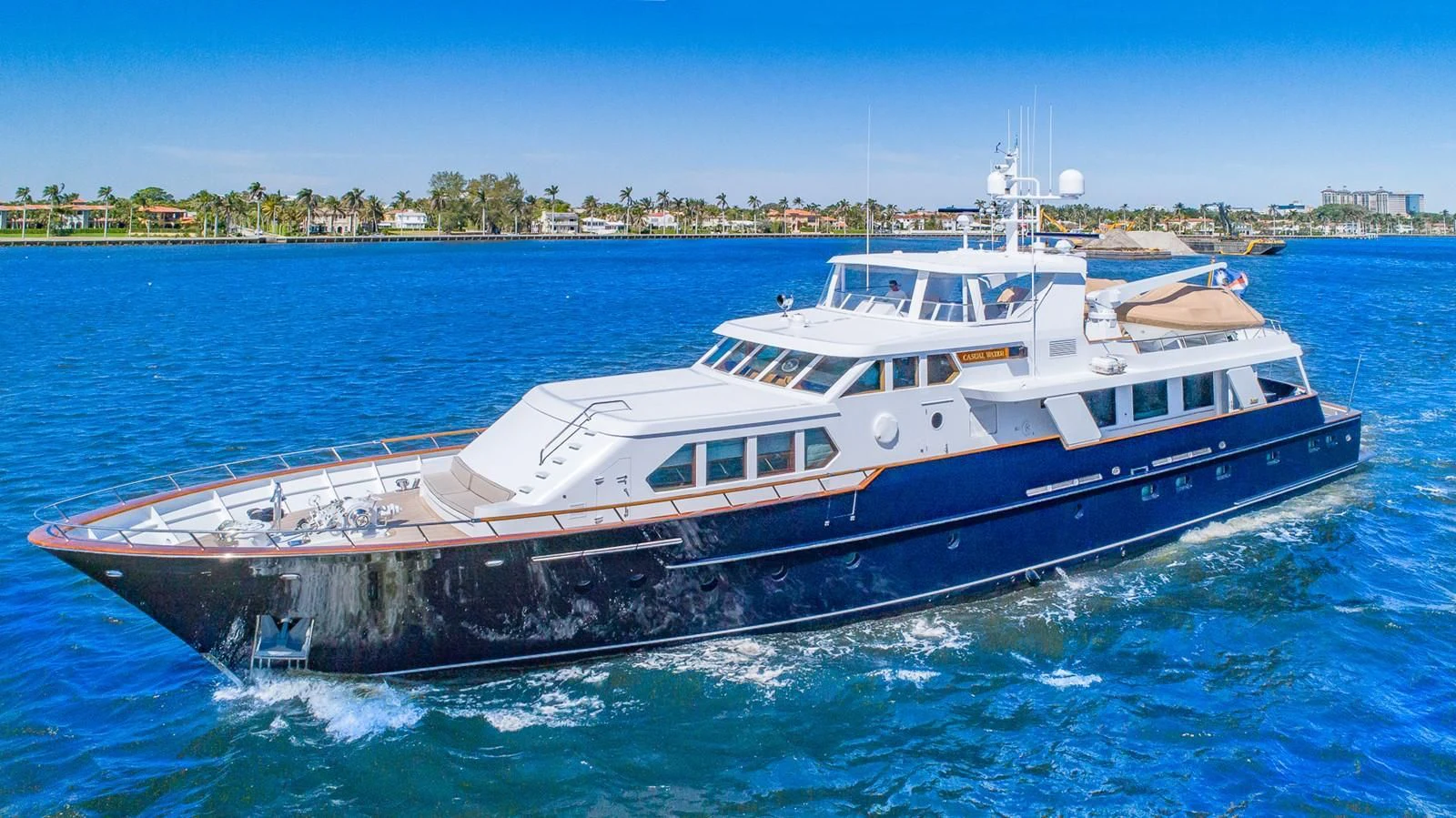 a large white boat on the water aboard CASUAL WATER Yacht for Sale