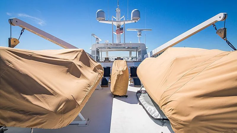 a group of tents and a satellite dish on a sunny day aboard CASUAL WATER Yacht for Sale