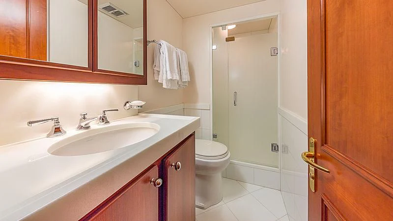 a bathroom with a sink and a toilet aboard CASUAL WATER Yacht for Sale