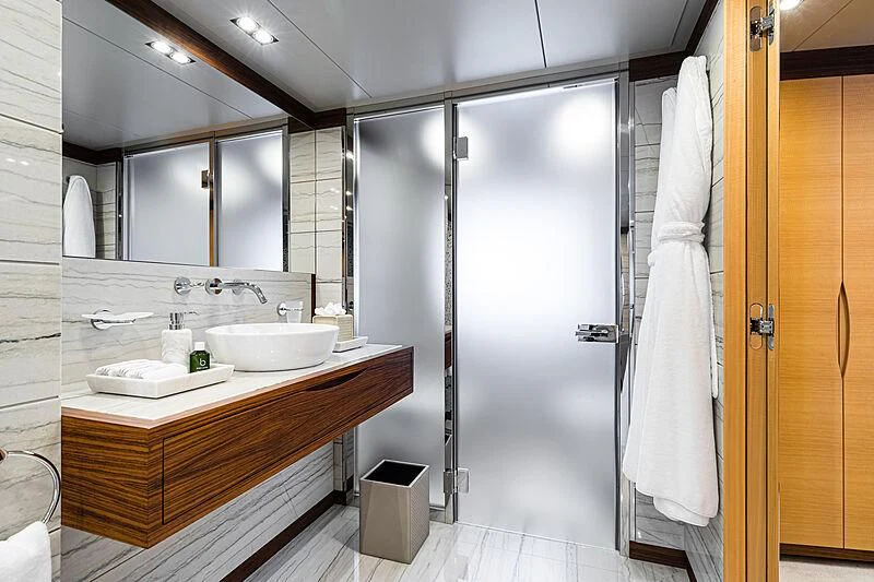 a bathroom with a sink and a shower aboard BOMBAY Yacht for Sale