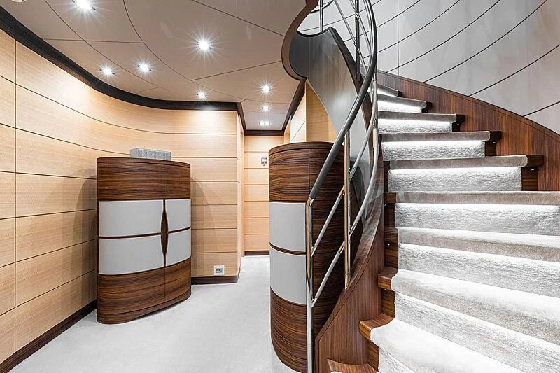 a wooden staircase with a wood box aboard BOMBAY Yacht for Sale