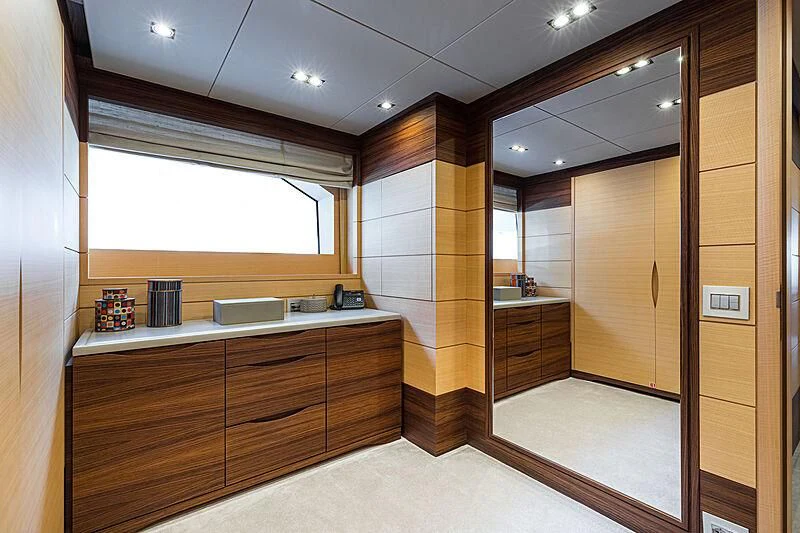 a room with a counter and cabinets aboard BOMBAY Yacht for Sale
