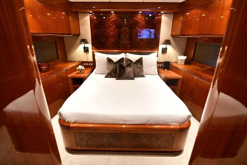 a bed in a room aboard DARK KNIGHT Yacht for Sale