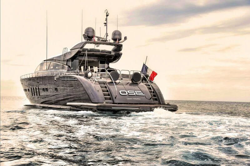 a large ship in the water aboard DARK KNIGHT Yacht for Sale