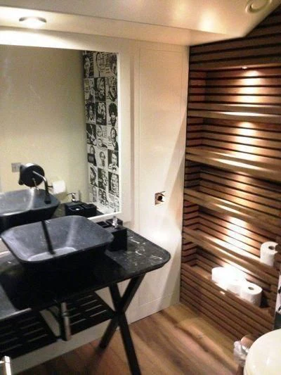 a bathroom with a sink and a shower aboard LUTTEUR Yacht for Sale